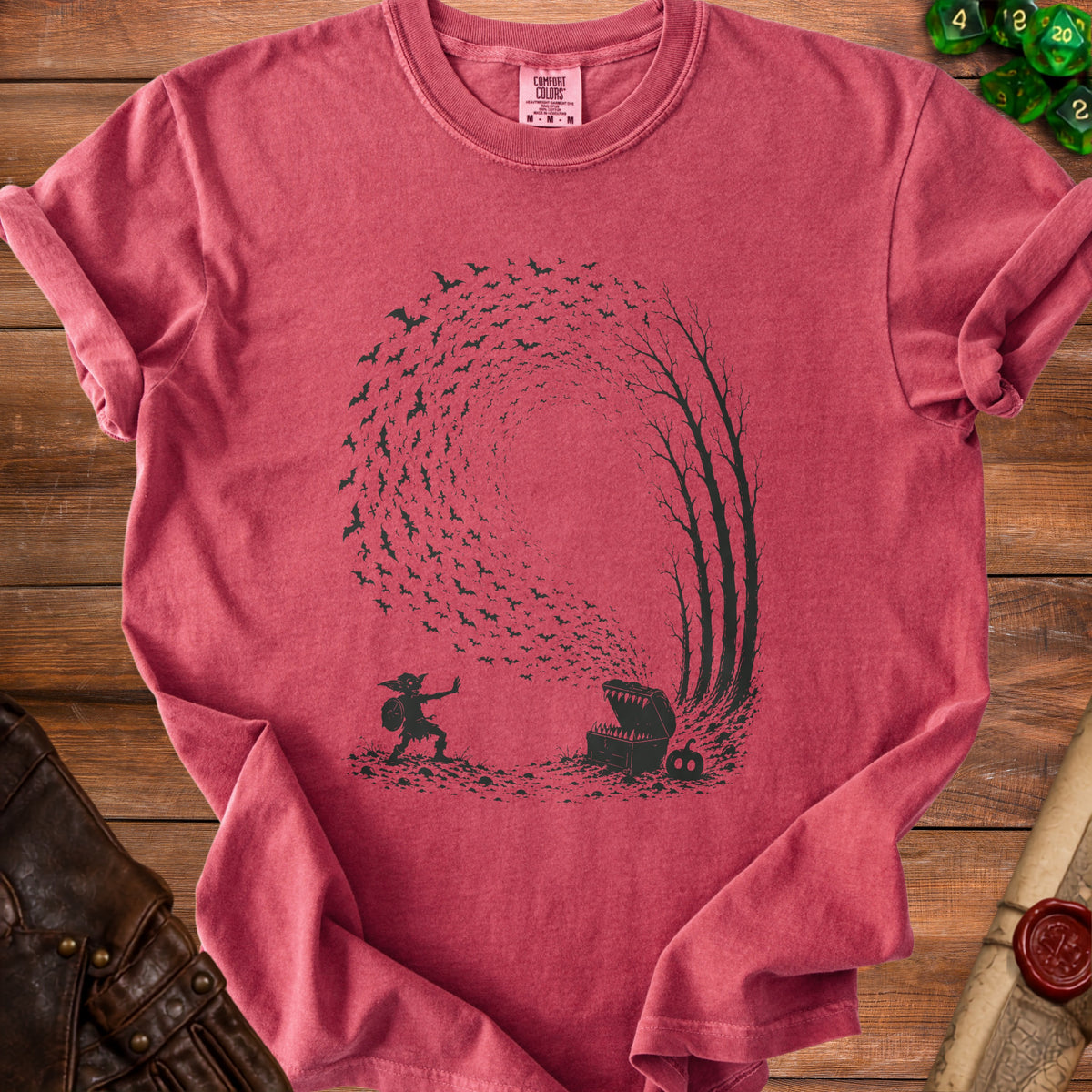 Red t-shirt with black graphic of a goblin, treasure chest, and swarming bats.