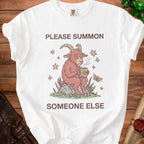 White t-shirt with "PLEASE SUMMON SOMEONE ELSE" and a tired goat holding coffee.