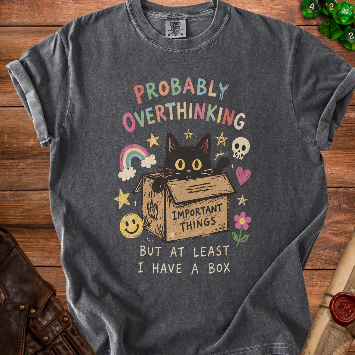 Dark gray t-shirt with black cat in a box and text "PROBABLY OVERTHINKING BUT AT LEAST I HAVE A BOX".