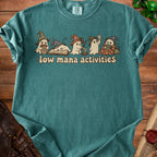 Teal t-shirt with four wizard ghosts and text "low mana activities".
