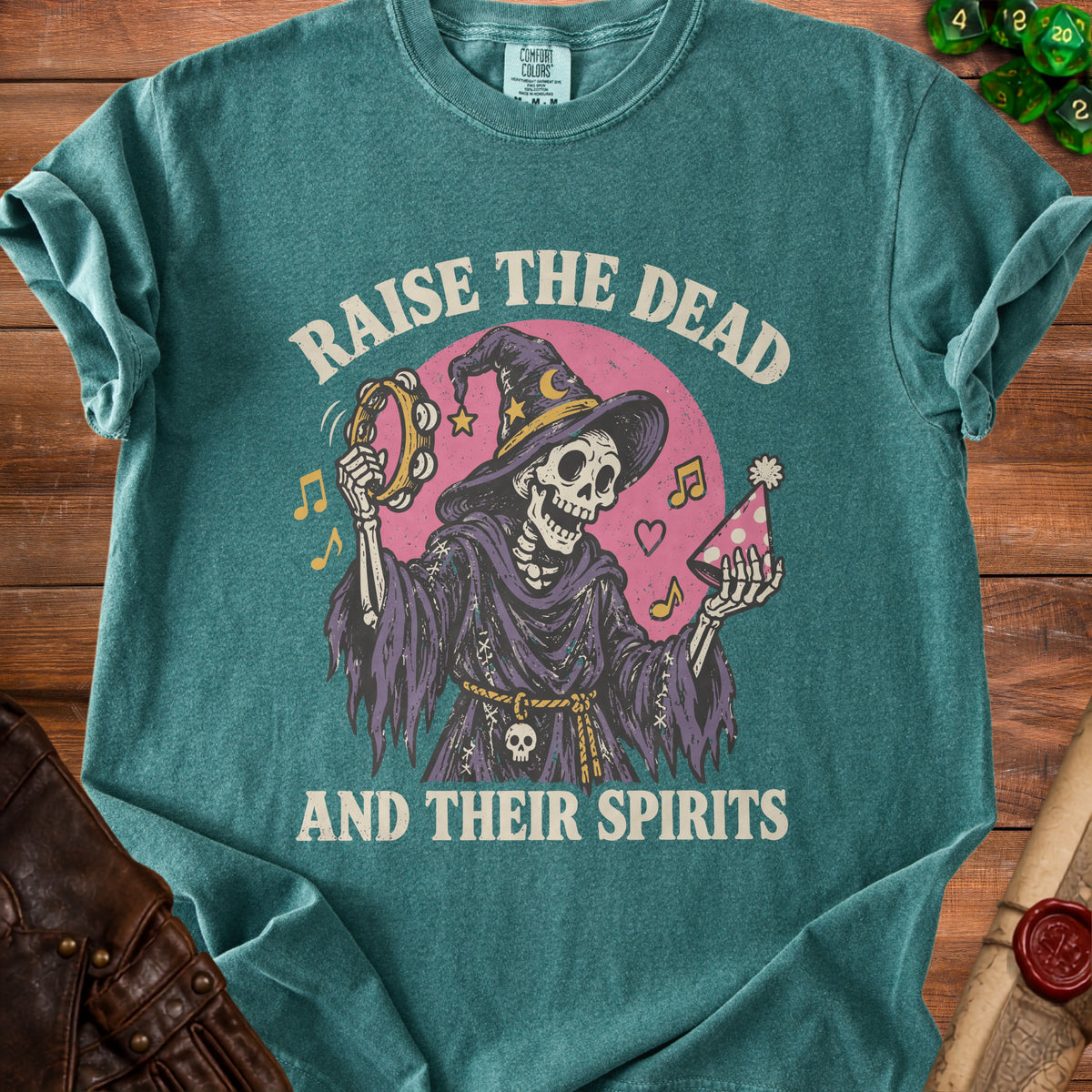 Skeleton in wizard hat plays tambourine and holds party hat, text reads "Raise the Dead and Their Spirits".
