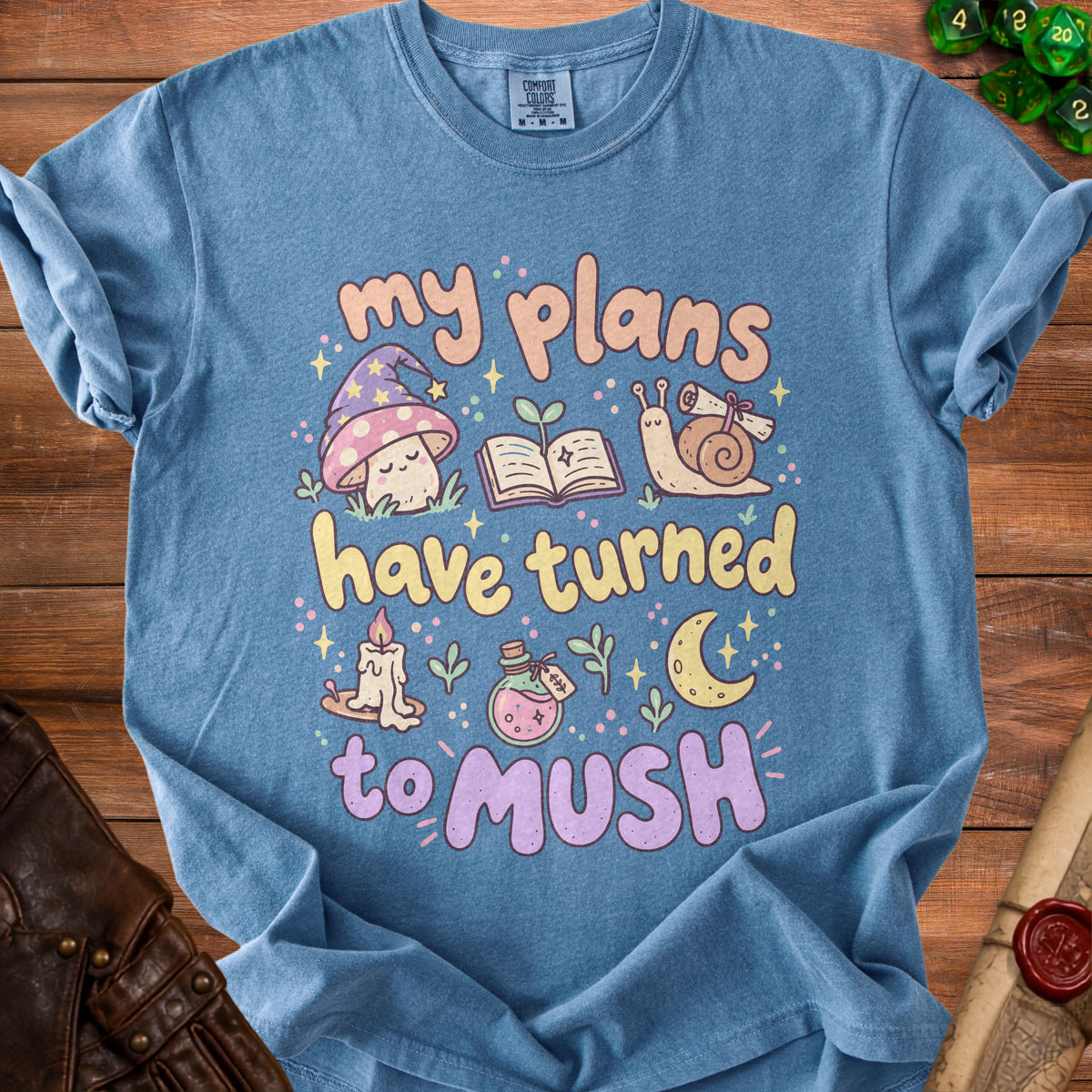 Blue t-shirt with "my plans have turned to mush" and mushroom design.