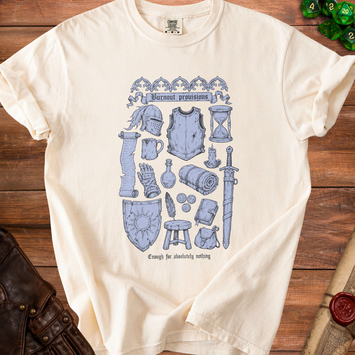 Cream t-shirt with medieval adventure gear illustration and text "Burnout provisions" and "Enough for absolutely nothing".