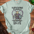 Light mint t-shirt with skeleton warrior graphic and text: Surviving Purely Out of Spite