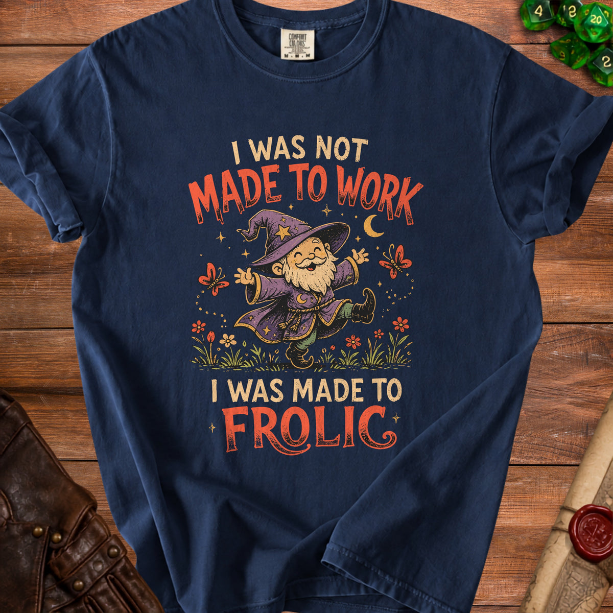 Navy t-shirt with wizard gnome graphic and text "I WAS NOT MADE TO WORK I WAS MADE TO FROLIC".