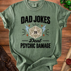 Green t-shirt with "Dad Jokes" and "Deal Psychic Damage" text, featuring a d20 die.