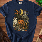Navy t-shirt with Halloween graphic: black cat, skeleton, pumpkin, ghost, moon, and haunted house.