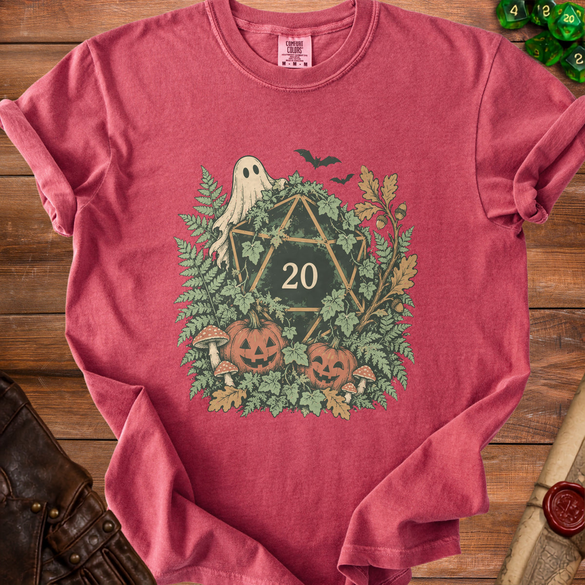 Crimson t-shirt with a Halloween D20 design featuring a ghost, pumpkins, mushrooms, and bats.