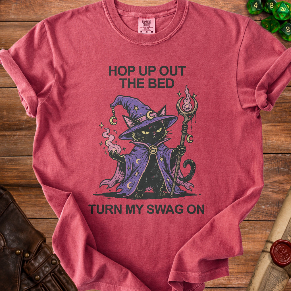 Red t-shirt with a black cat wizard graphic and text "Hop up out the bed, turn my swag on."