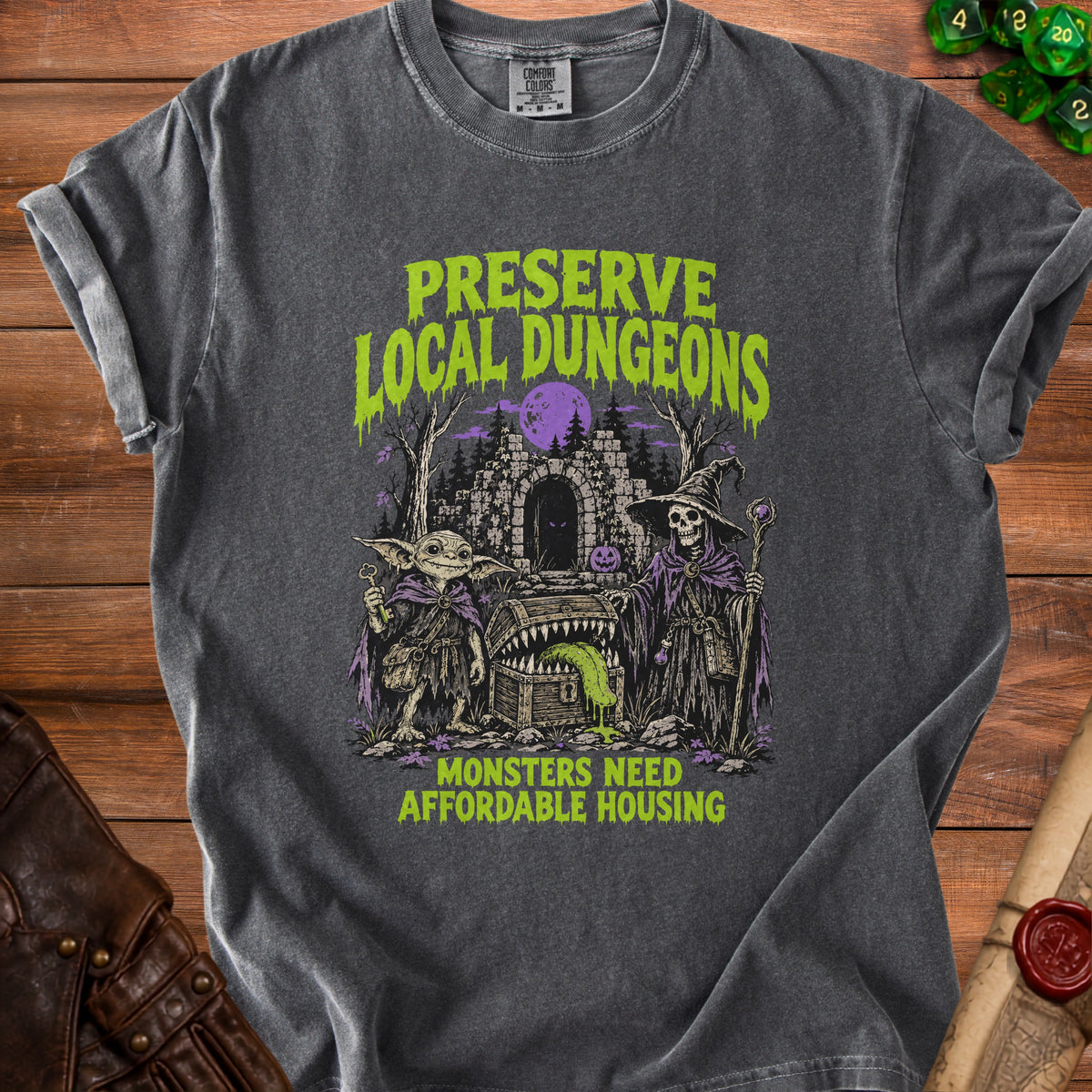 T-shirt with "Preserve Local Dungeons Monsters Need Affordable Housing" graphic.