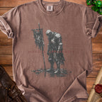 Brown t-shirt with distressed knight graphic and "MONDAY APPARENTLY" text.