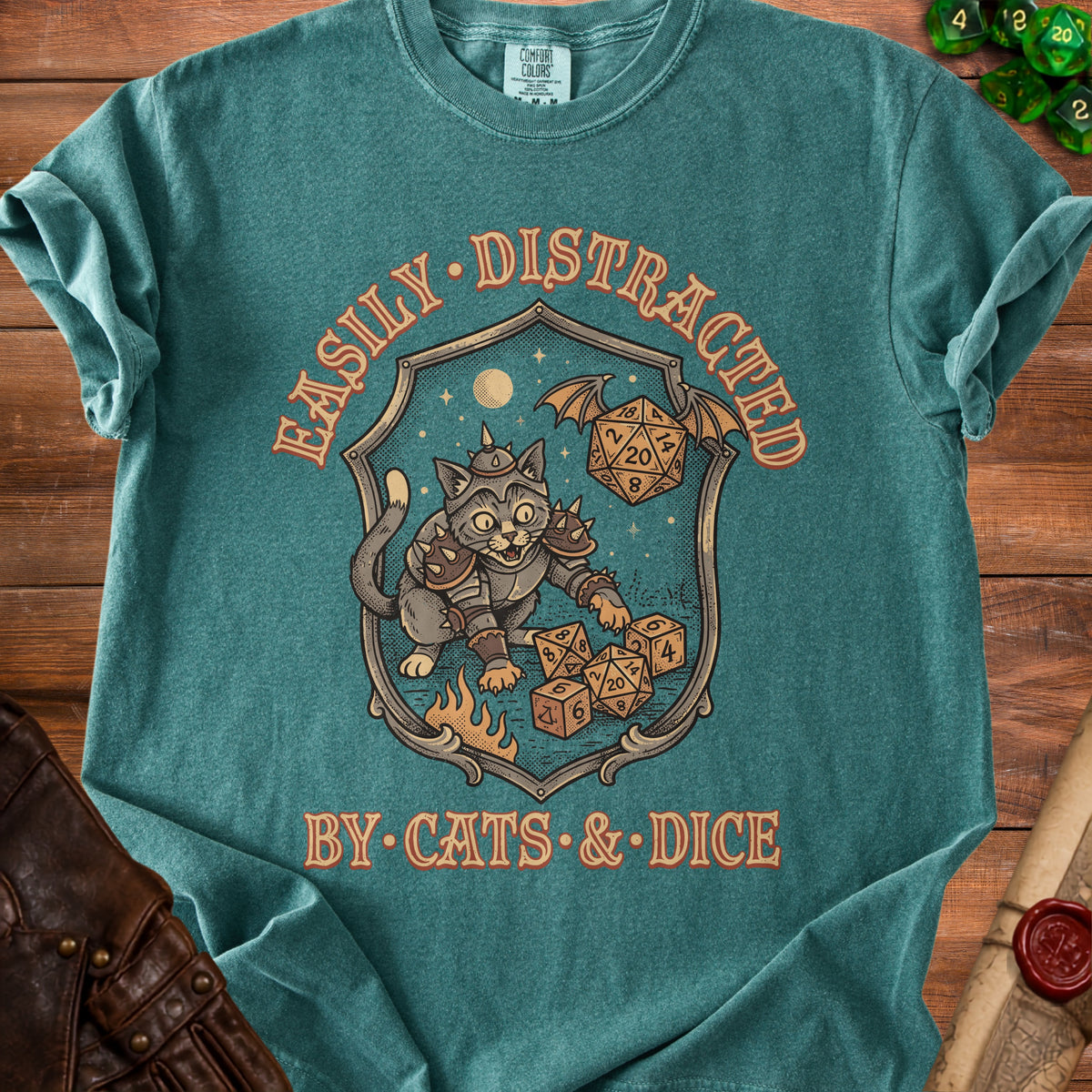Teal t-shirt with "Easily Distracted By Cats & Dice" text and D&D dice.