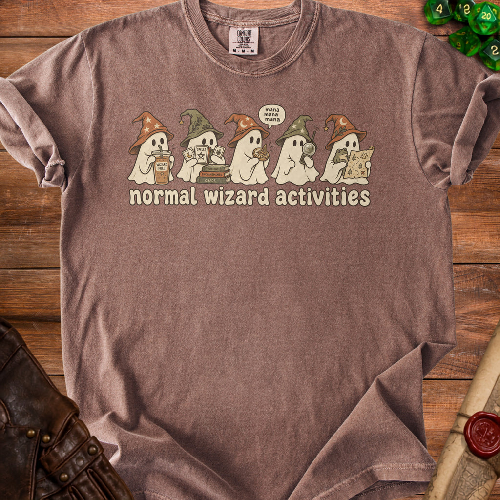 Brown t-shirt with ghosts in wizard hats performing "normal wizard activities" and text.