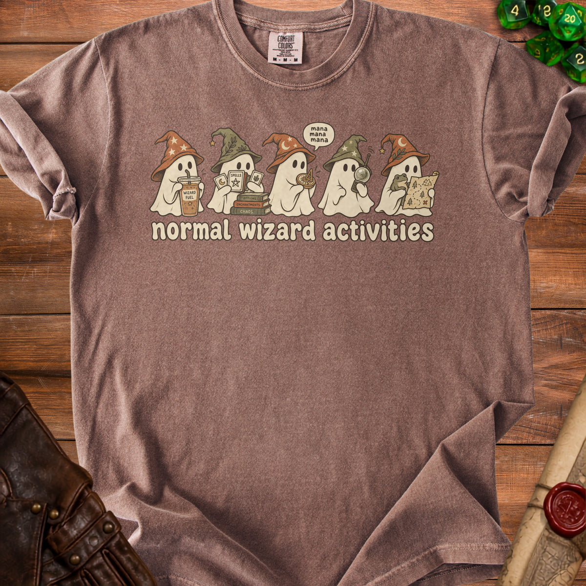Brown t-shirt with ghosts in wizard hats performing "normal wizard activities" and text.