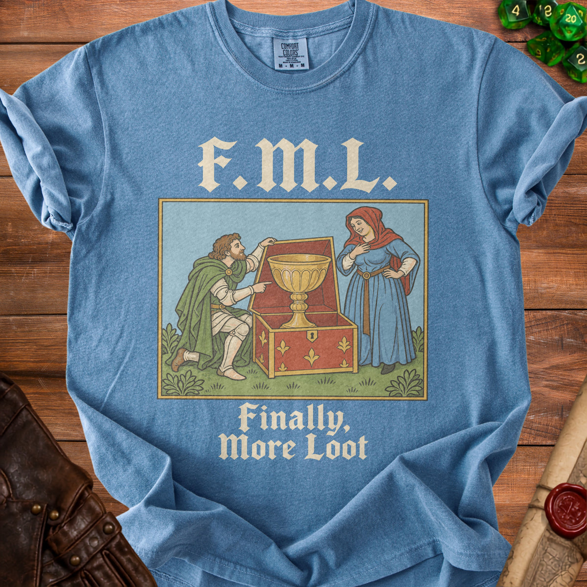 Blue t-shirt with "F.M.L. Finally, More Loot" and medieval illustration.
