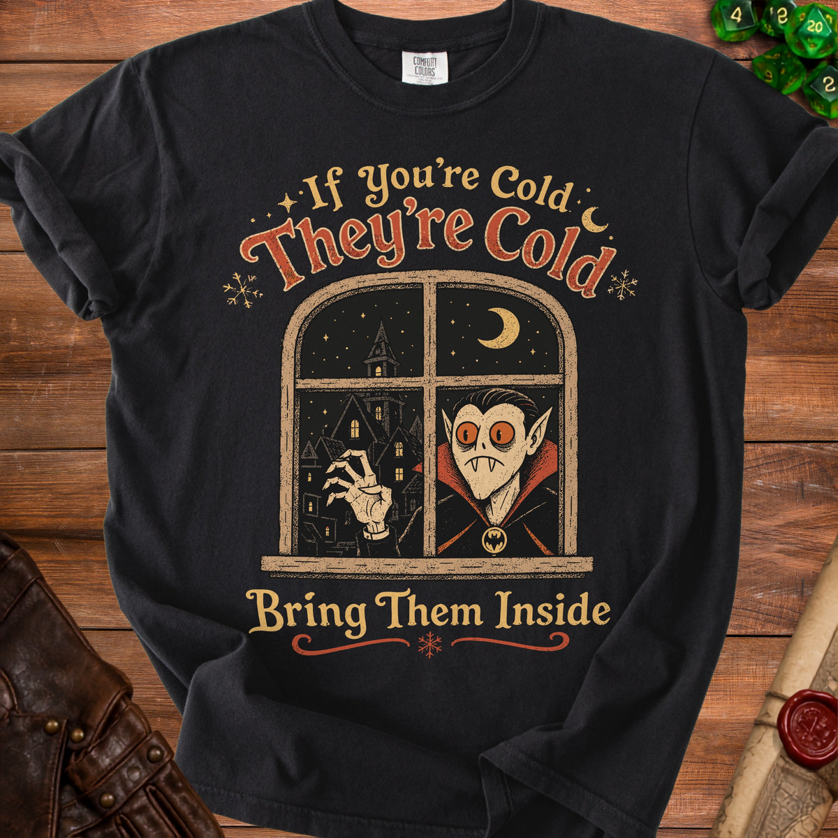 Black t-shirt with vampire and house graphics and text "If You're Cold They're Cold Bring Them Inside".