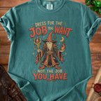 Teal t-shirt with wizard graphic and "Dress for the job you want, not the job you have" text.