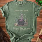 Green t-shirt with text "There is no secret. The only thing you have to do is continue."
