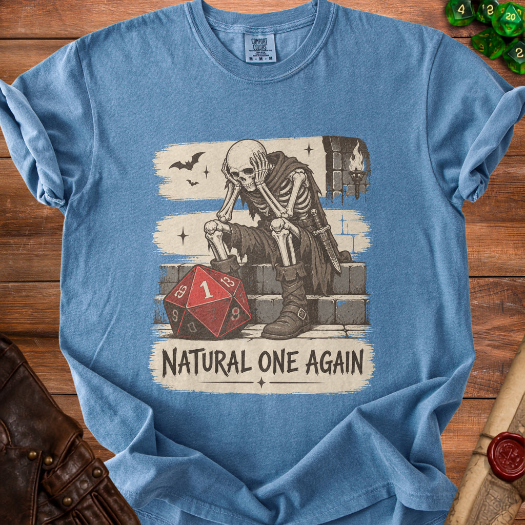 Skeleton sitting with head in hands beside a d20 die, text "NATURAL ONE AGAIN".