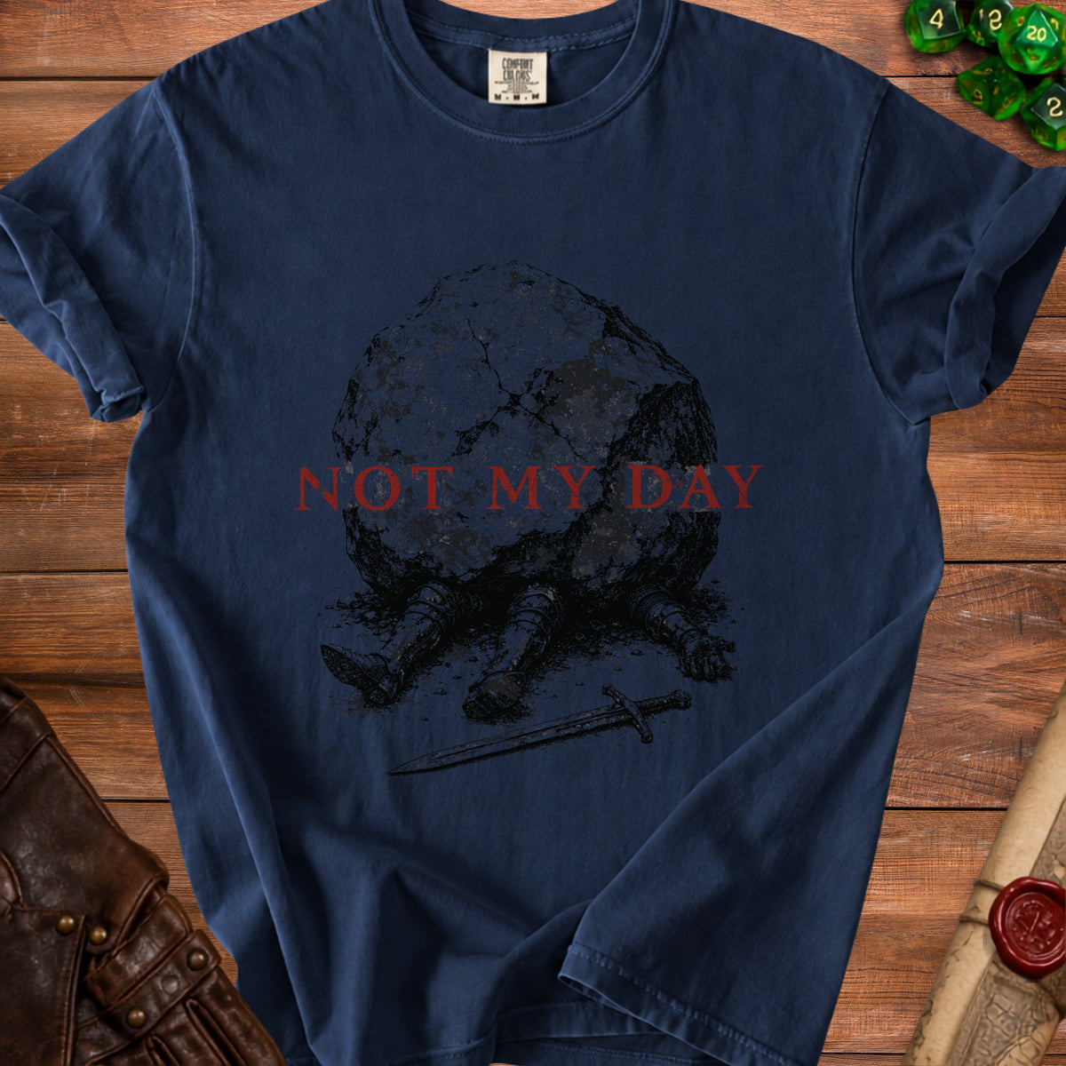 T-shirt with illustration of knight trapped under a rock with text "NOT MY DAY".