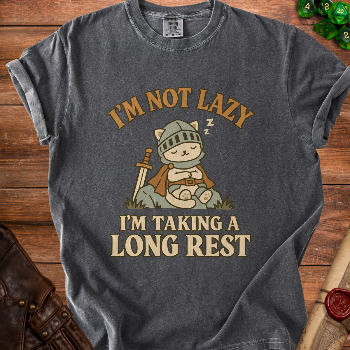 T-shirt with a sleeping knight cat graphic and the text "I'm not lazy, I'm taking a long rest."