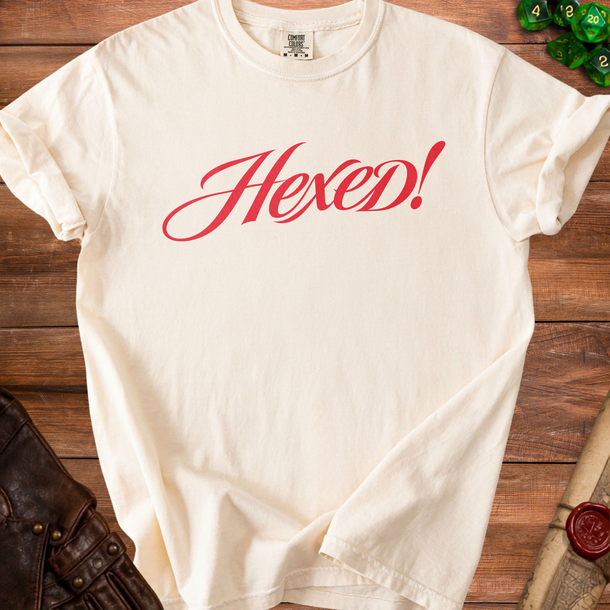 Cream t-shirt with red "Hexed!" text, featuring a Comfort Colors tag.