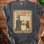 T-shirt with wizard holding jar with angry demon, goblin receiving it, and text "THY PROBLEM NOW".