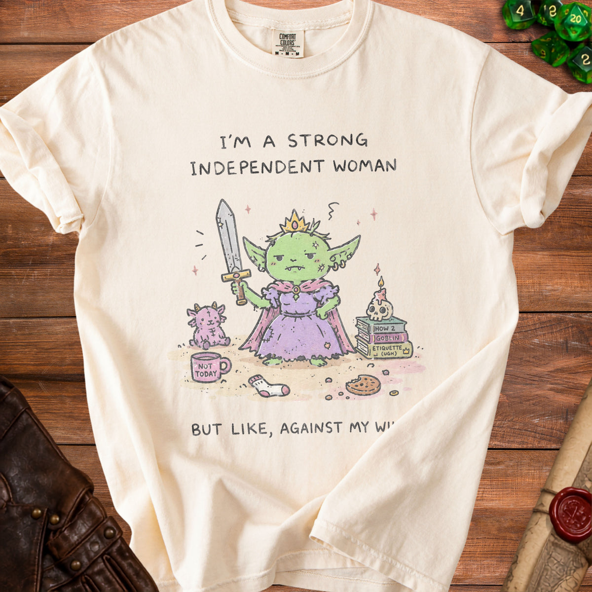 Cream t-shirt with cartoon goblin holding sword, text "I'M A STRONG INDEPENDENT WOMAN".