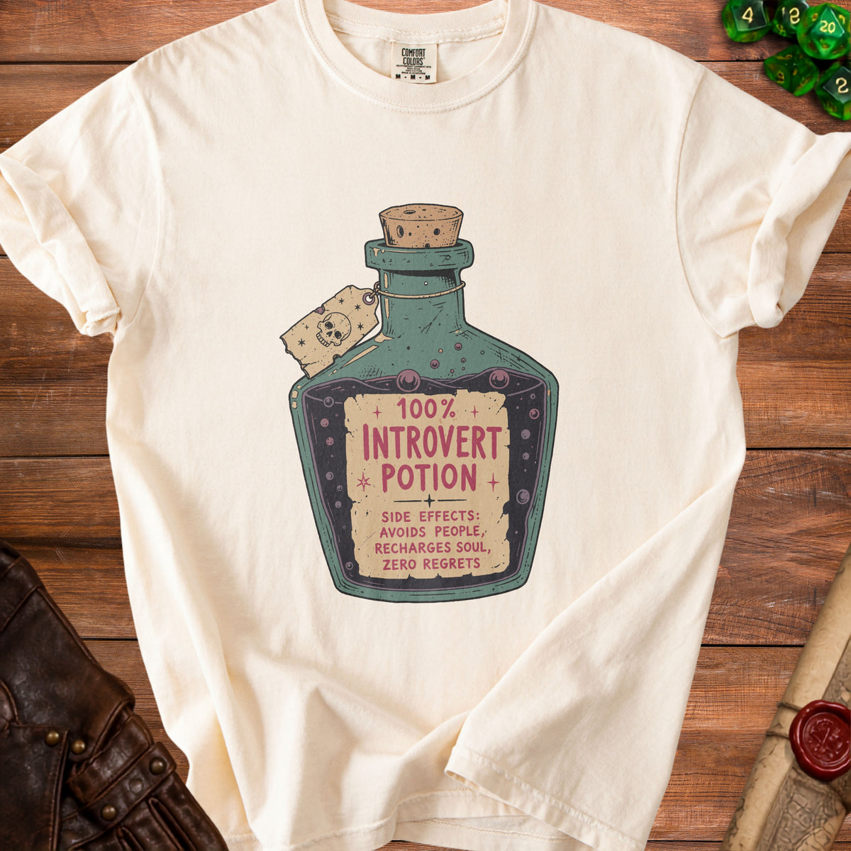 Cream t-shirt with "100% Introvert Potion" and side effects text.