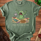 Green t-shirt with a cartoon goblin, dice, laptop, pizza, and text "PANIC IS A FREE ACTION".