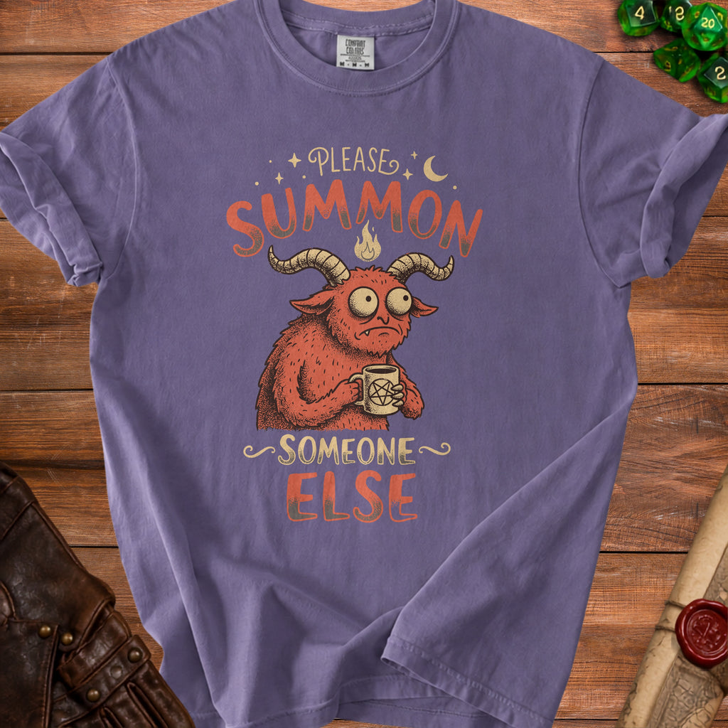 Purple t-shirt with cartoon demon holding pentagram mug and text "Please Summon Someone Else."