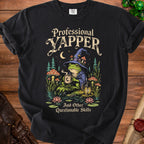 Black t-shirt with wizard frog holding coffee, reads "Professional Yapper And Other Questionable Skills".