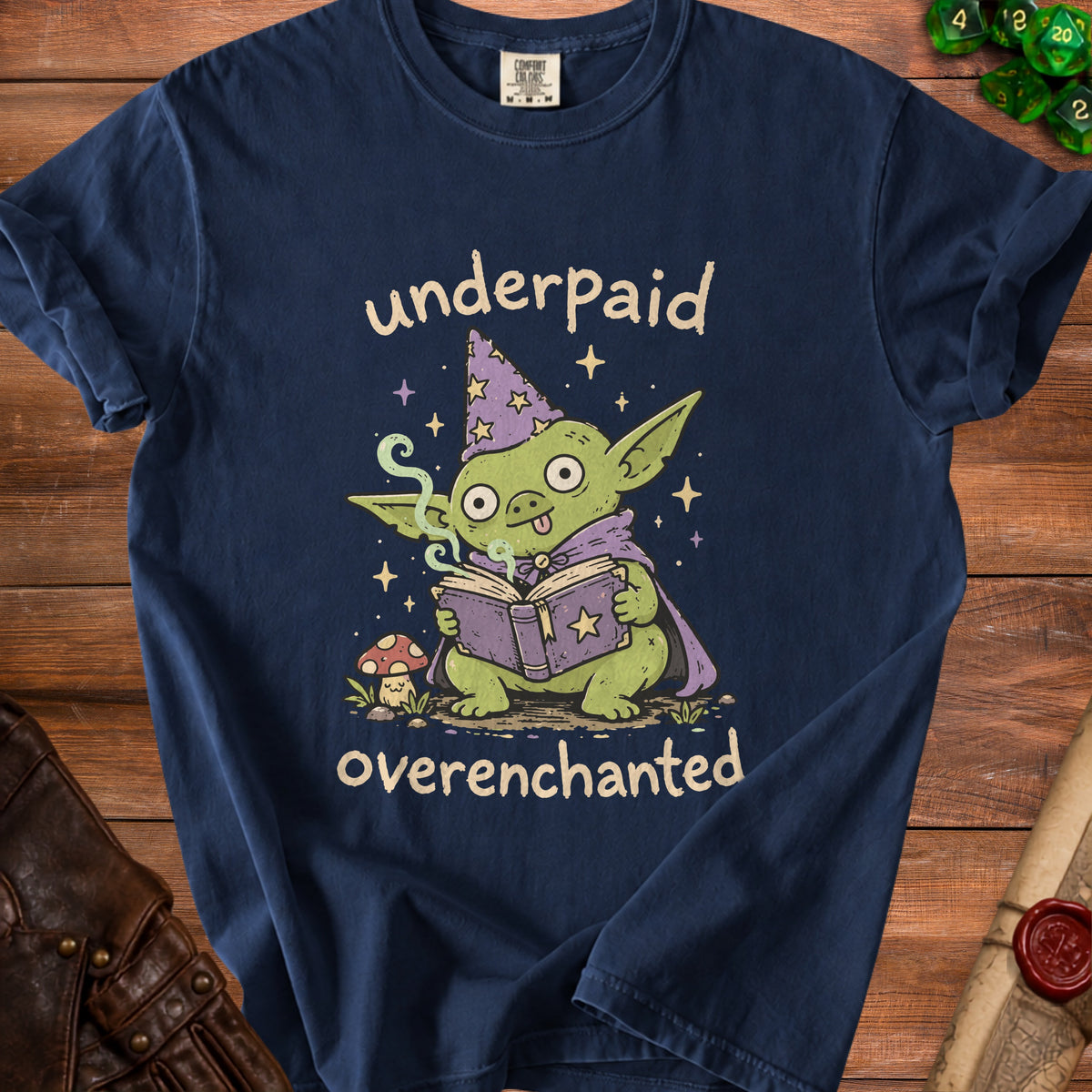 Green creature in wizard hat reading book, text "underpaid overenchanted."