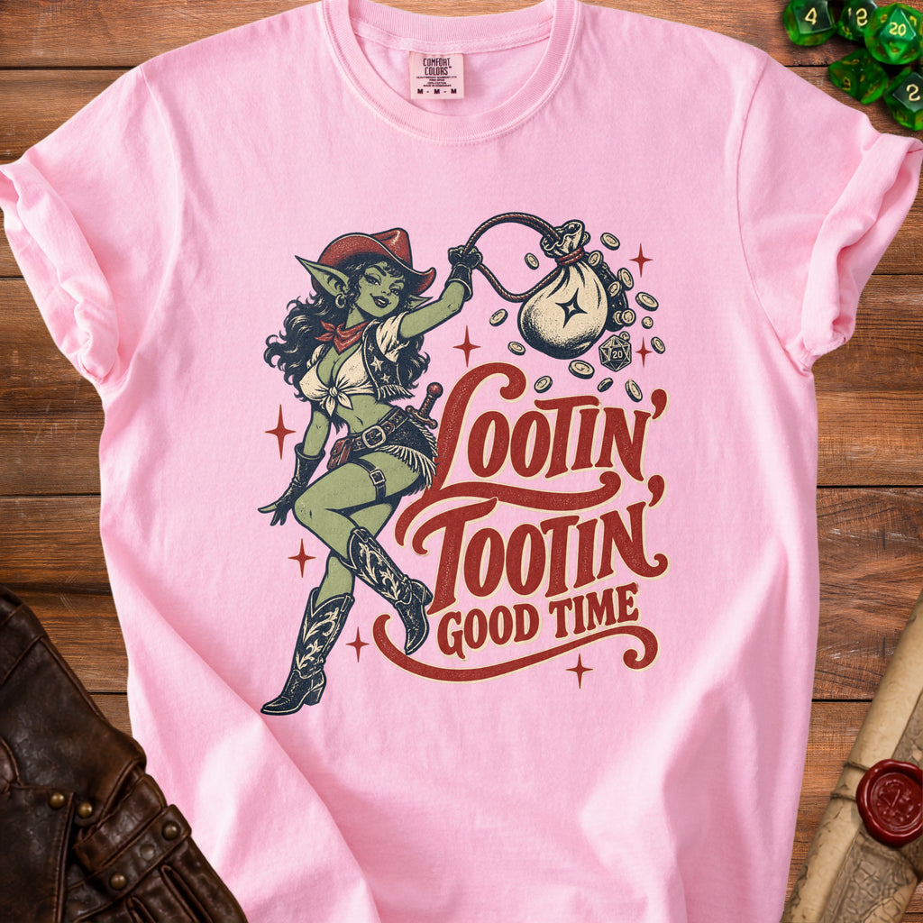 Pink t-shirt with goblin cowboy graphic and text "Lootin' Tootin' Good Time".