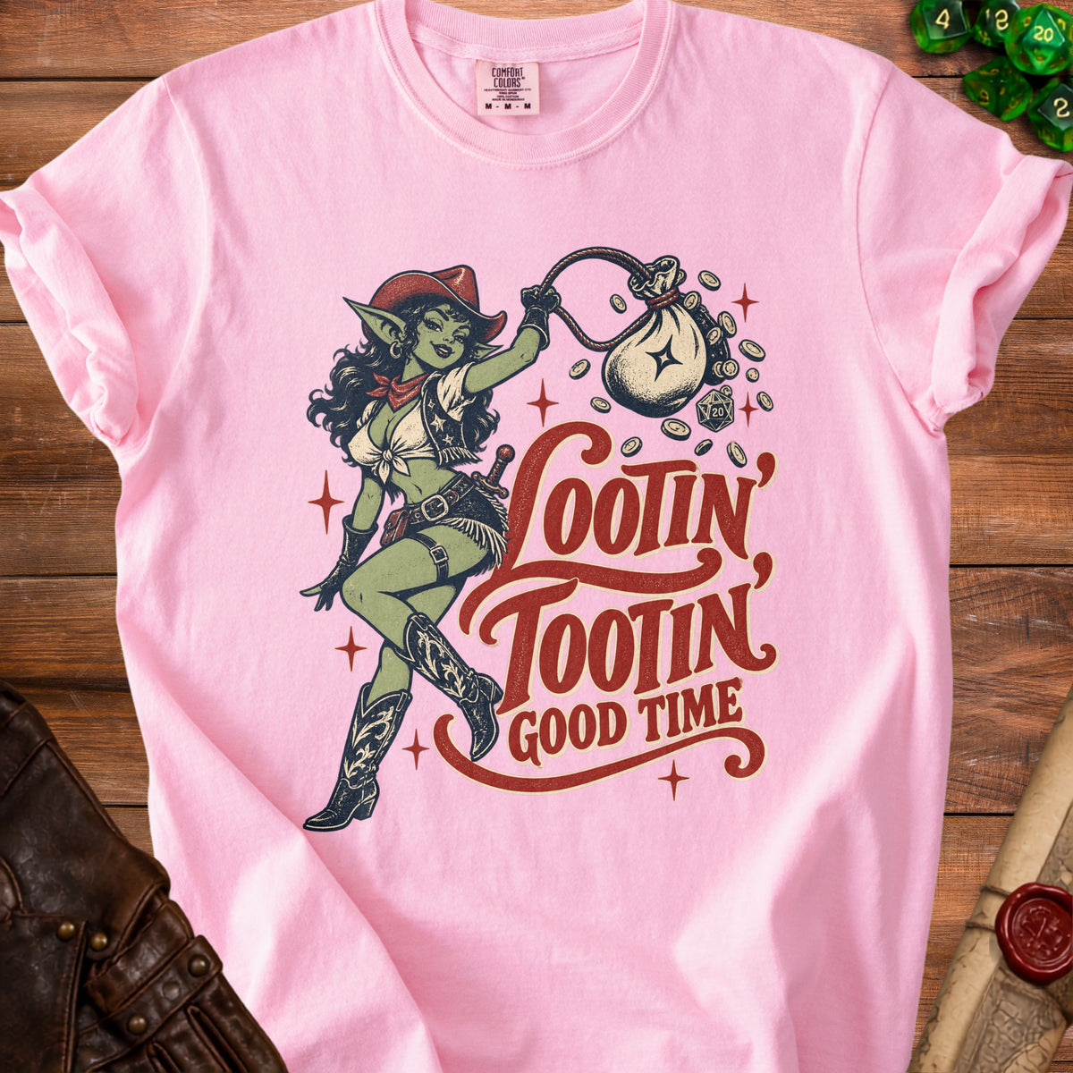 Pink t-shirt with goblin cowboy graphic and text "Lootin' Tootin' Good Time".