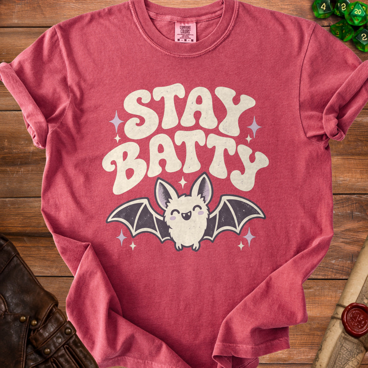 Red t-shirt with "STAY BATTY" and a cartoon bat graphic.