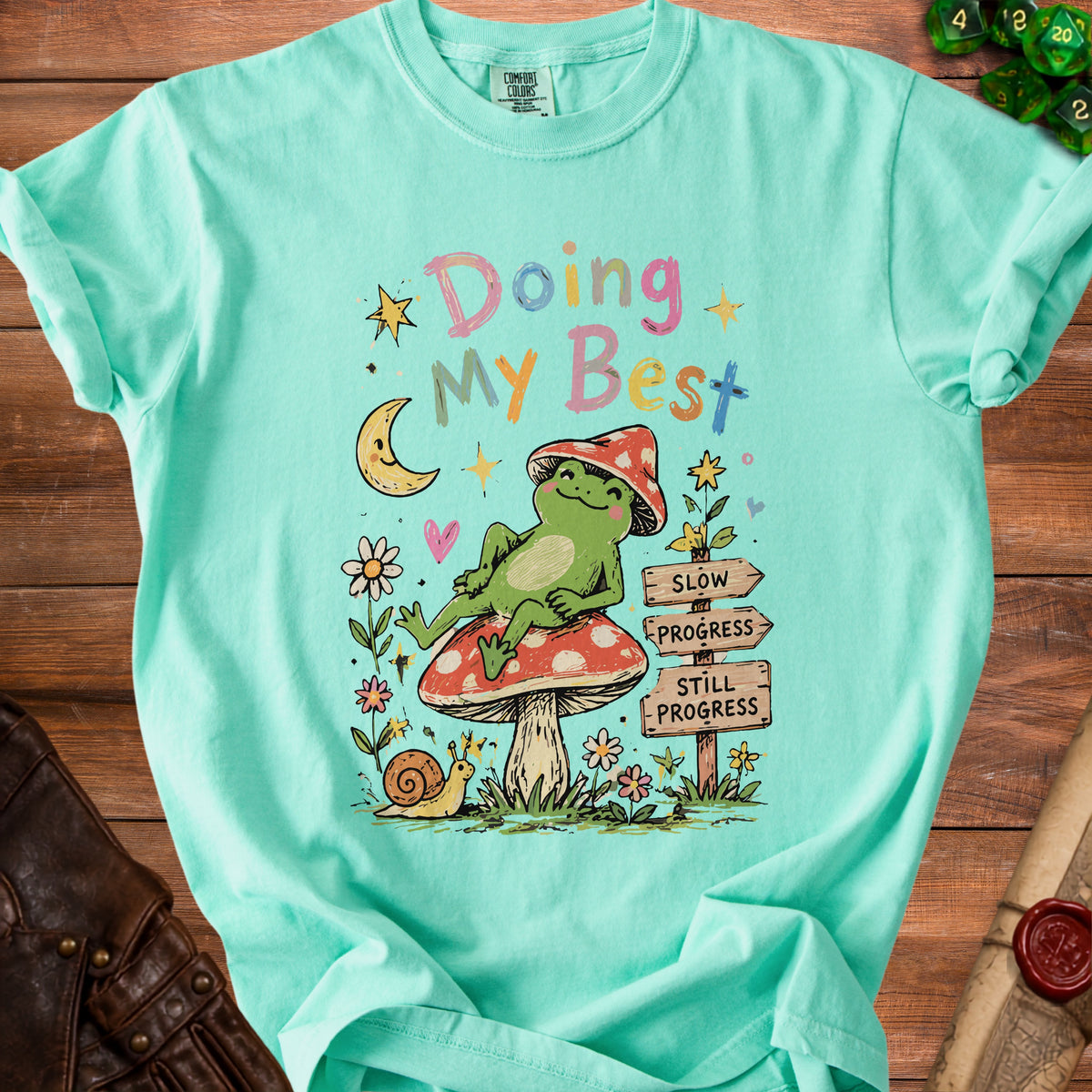 Mint t-shirt with frog on mushroom, moon, stars, and text "Doing My Best".