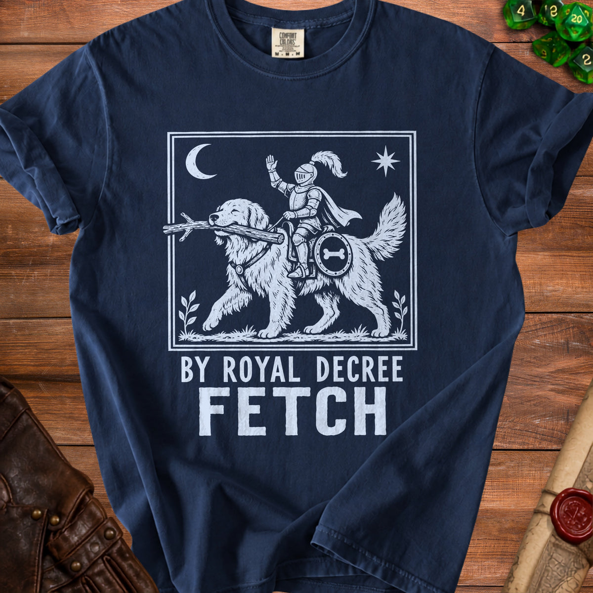 T-shirt with knight riding dog and text "BY ROYAL DECREE FETCH".
