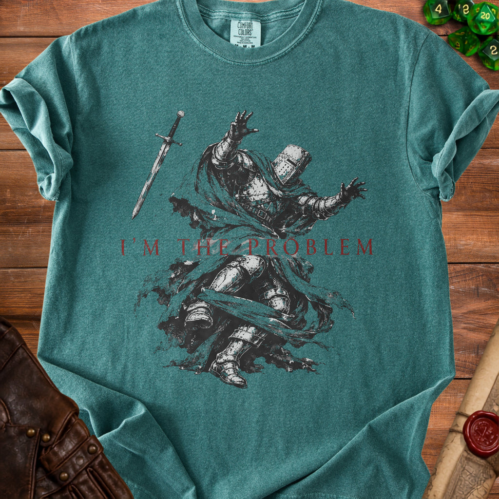 Green t-shirt with a knight graphic and text "I'M THE PROBLEM".