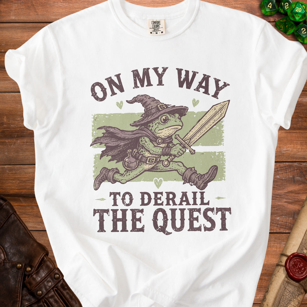 Frog in wizard hat with sword and cape, text reads "On My Way To Derail The Quest".
