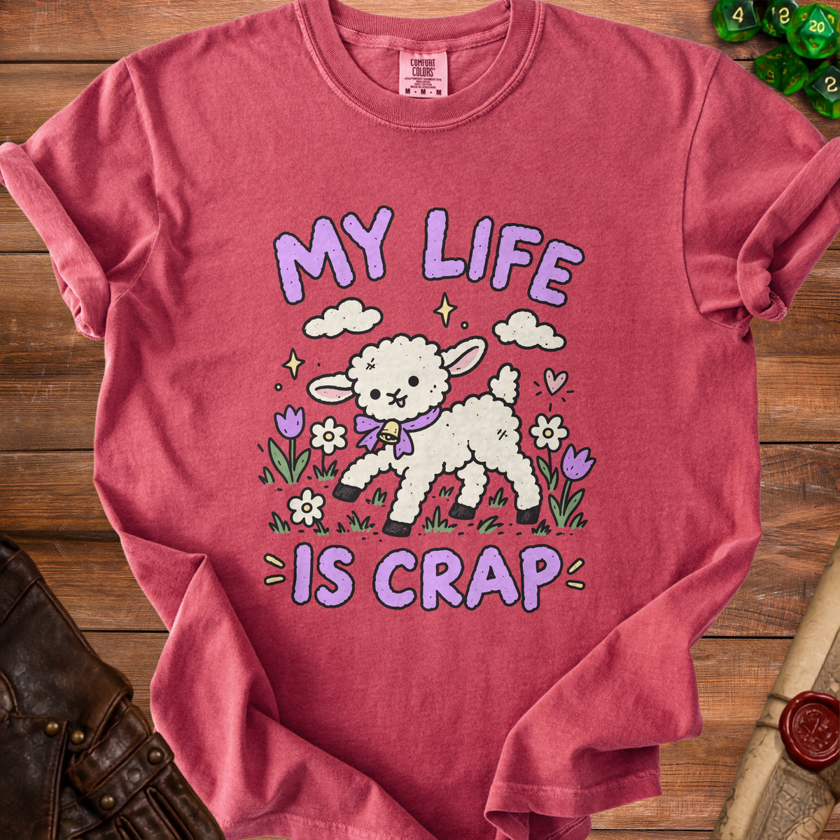 Red t-shirt with a cartoon lamb and the text "MY LIFE IS CRAP".