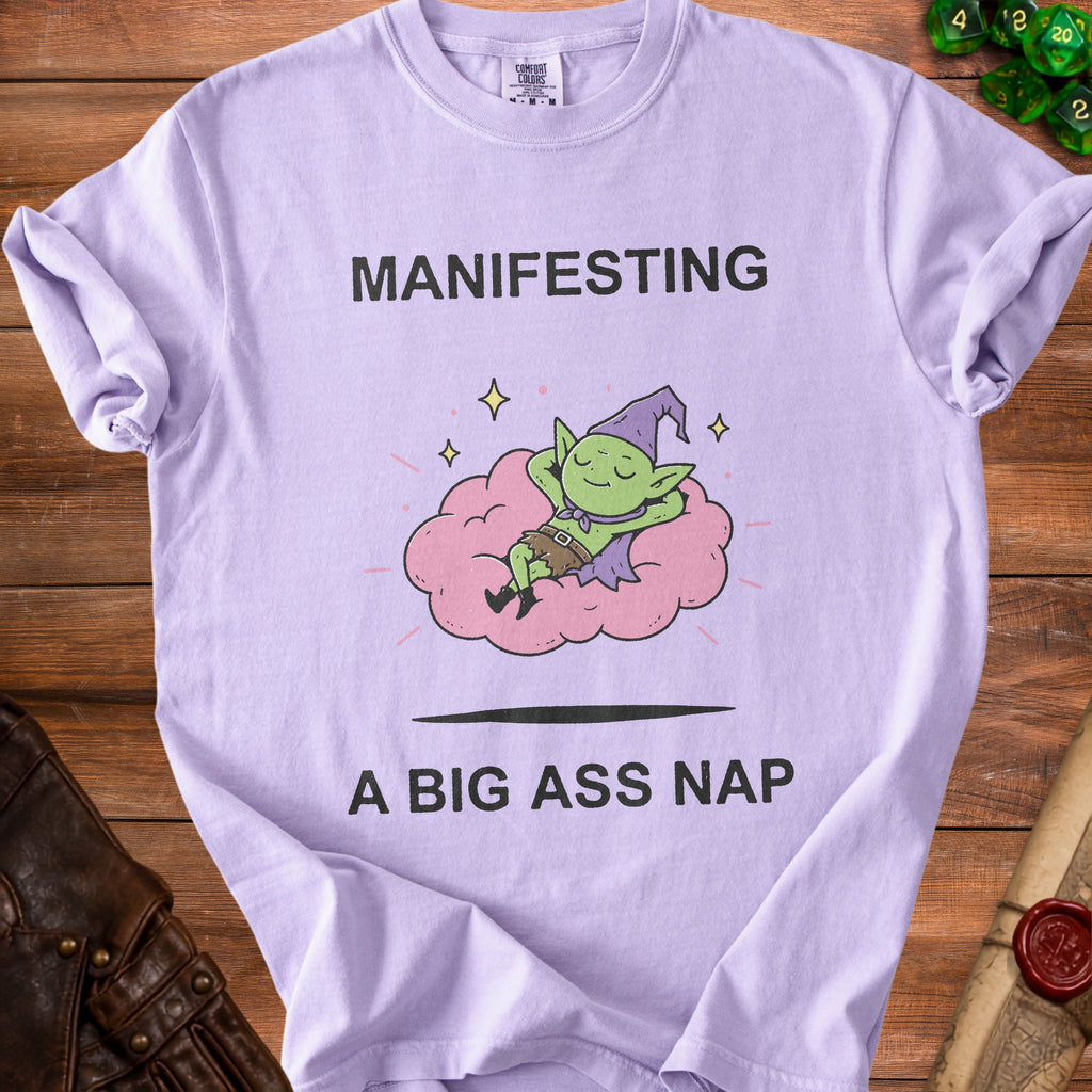 Purple t-shirt with black text and a cartoon goblin sleeping on a pink cloud.