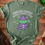 Green t-shirt with a green goblin in a purple hat holding a potion and staff.