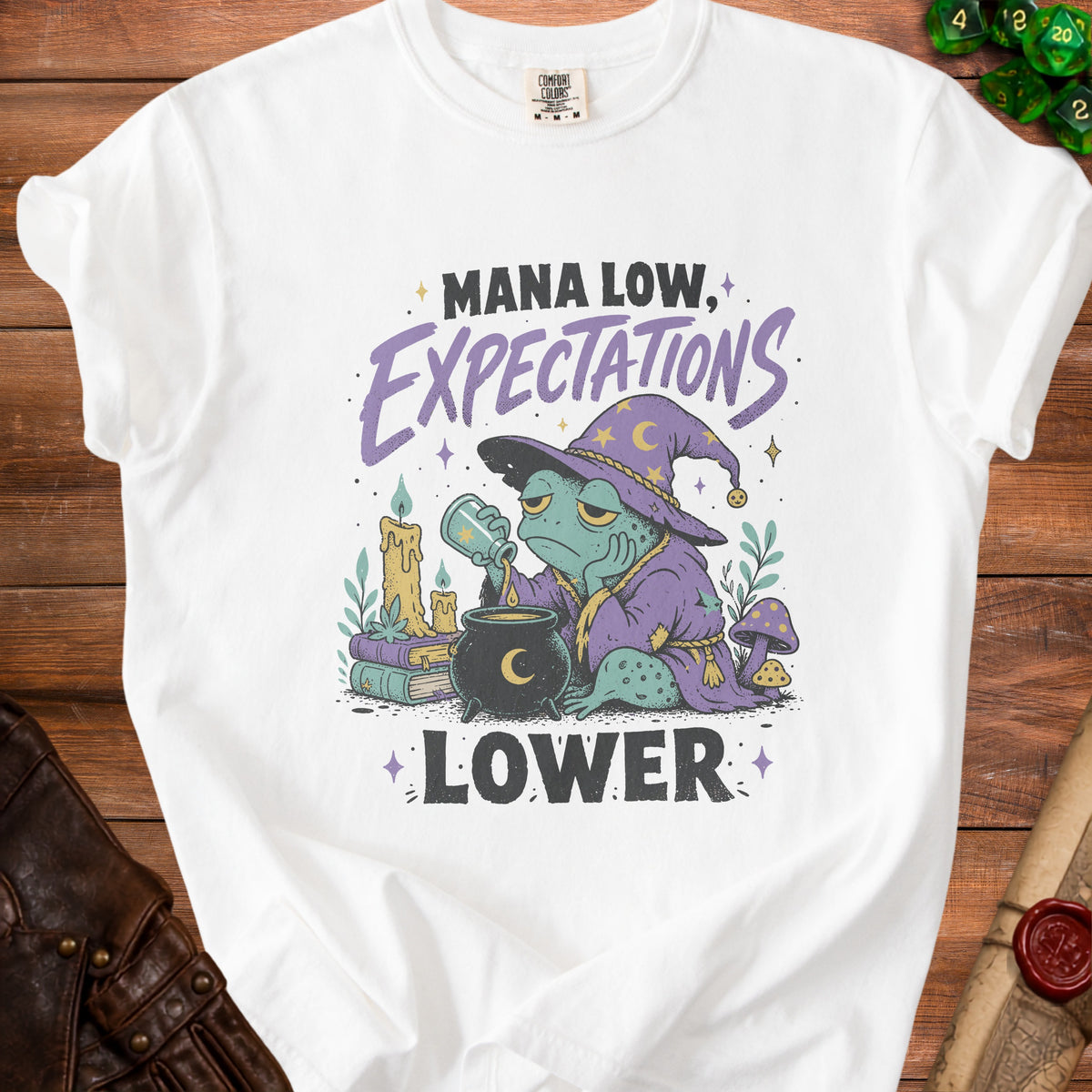 White t-shirt with a wizard frog and text "Mana Low, Expectations Lower".