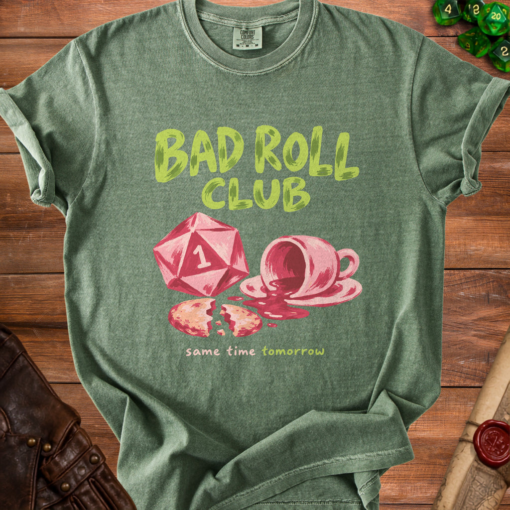 Green t-shirt with "BAD ROLL CLUB" graphic of dice and spilled coffee.