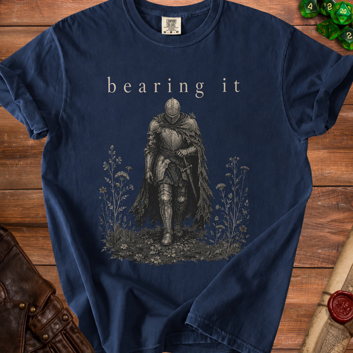 Navy t-shirt with a knight in armor and text "bearing it"