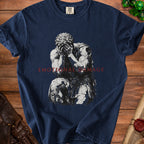 Navy t-shirt with a cracked stone statue graphic and "EMOTIONAL DAMAGE" text.