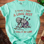 Mint t-shirt with knight graphic and text "I THINK I NEED A LONG REST I CALL IT MY LORE".