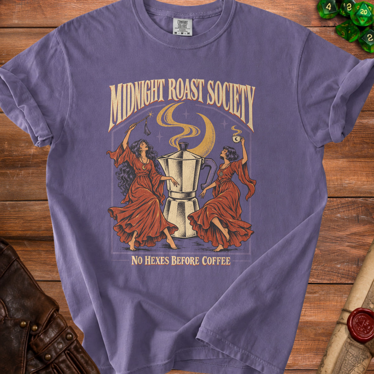 Purple t-shirt with "Midnight Roast Society" and "No Hexes Before Coffee" text and graphic.