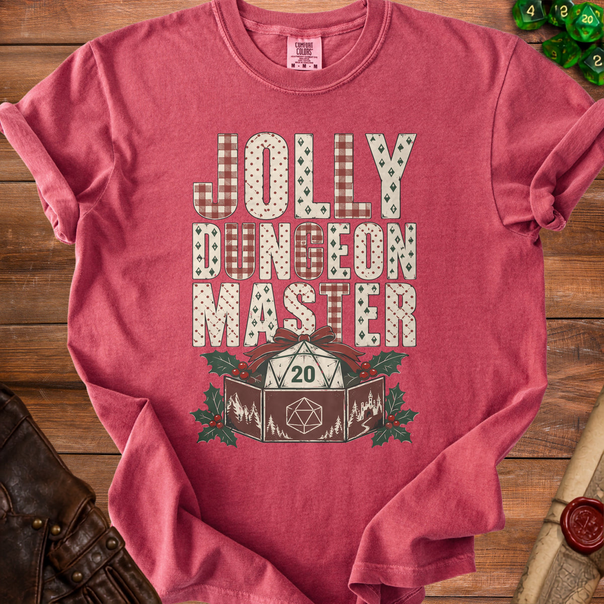 Red t-shirt with "Jolly Dungeon Master" text, a d20 dice, and holly.